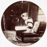 Woman Reading on Sofa