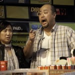 Photo by Cylla von Tiedemann. Esther Jun (left) and Paul Sun-Hyung Lee (right) in Kim's Convenience.